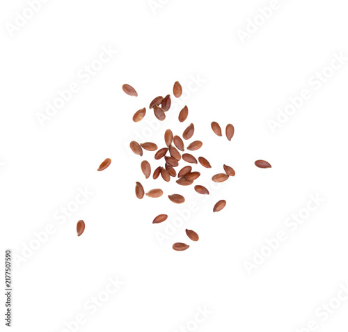 small group of brown organic flax seeds scattered isolated on white background, linseed superfood ingredient for healthy dietary nutrition, top view macro closeup