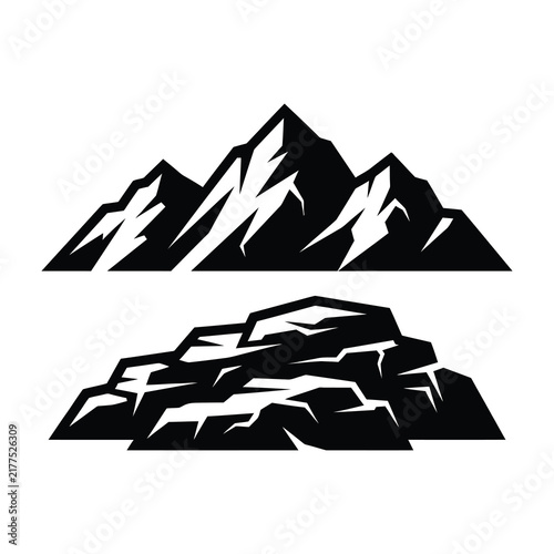 Mountain range landscape with snow covered peaks and rocky hills