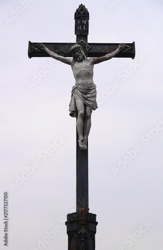 Принти на полотні Crucifixion of Christ isolated white sky background Catholicism Christianity fai