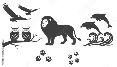 Black silhouette collection of wild animals featuring flying eagles, perched owls, standing lion, jumping dolphins, and paw prints.