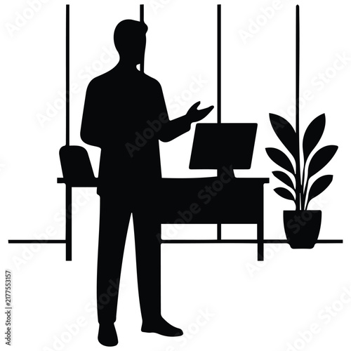 Professional speaker presenting ideas in modern office interior with plants silhouette.