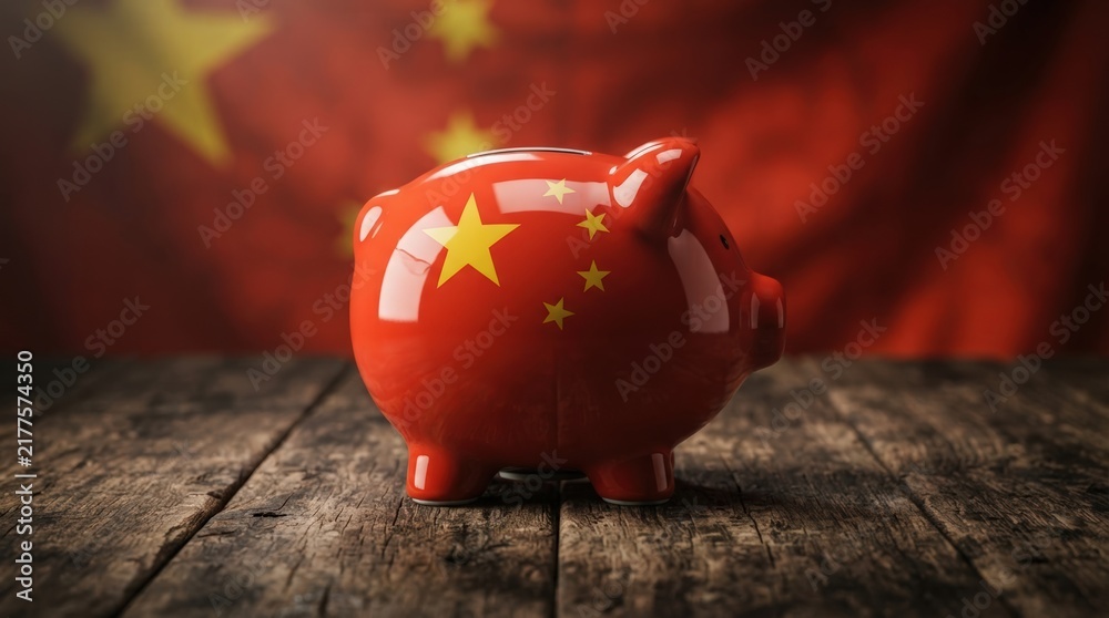 Stylish red piggy bank featuring Chinese flag design on glossy surface, perfect for finance marketing, business presentations, website banners, or thematic backdrops.