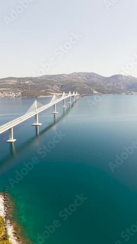 Aerial view of the impressive Pelješac Bridge, connecting mainland Croatia with the Pelješac Peninsula across the Adriatic Sea.