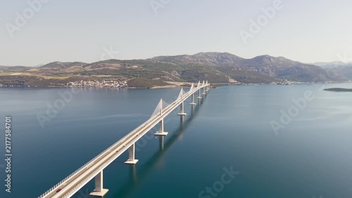 Aerial view of the impressive Pelješac Bridge, connecting mainland Croatia with the Pelješac Peninsula across the Adriatic Sea.