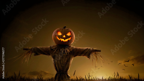 Scary Halloween scarecrow with glowing jack-o-lantern head in a dark field at night.