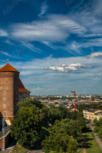 Wawel Castle tower overlooking Krakow city panorama in Poland