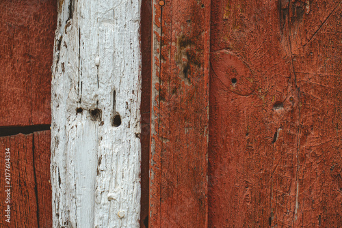 Weathered, faded paint wood building exterior in Ouray, Colorado