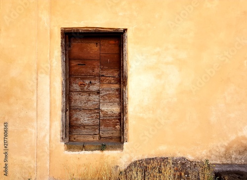 Ancient Wooden Door Rustic Stucco Wall