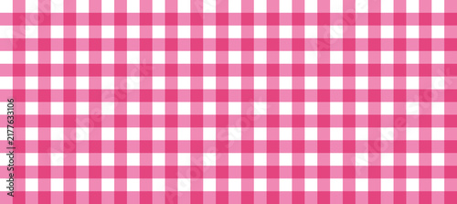 Pink and white gingham pattern with a classic checkered fabric design for summer picnic tablecloths