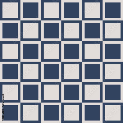 Seamless pattern created from rows of pale grey and navy blue squares in larger navy blue and pale grey squares