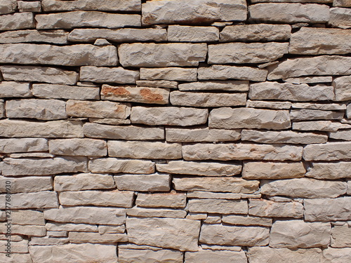 Stone brick wall close up texture