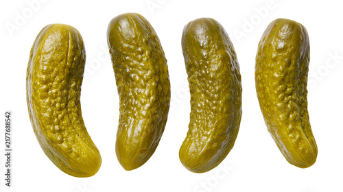 Obraz na plátně Isolated four vibrant green pickled gherkins arranged in a neat row, delicious a