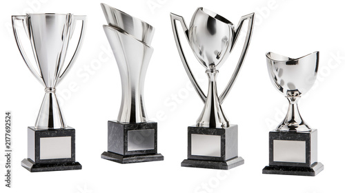 Fotografía Isolated group of four shiny silver metal trophies representing victory and exce