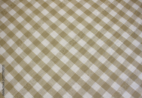 Foto Texture of crumpled gold and white gingham linen like cloth