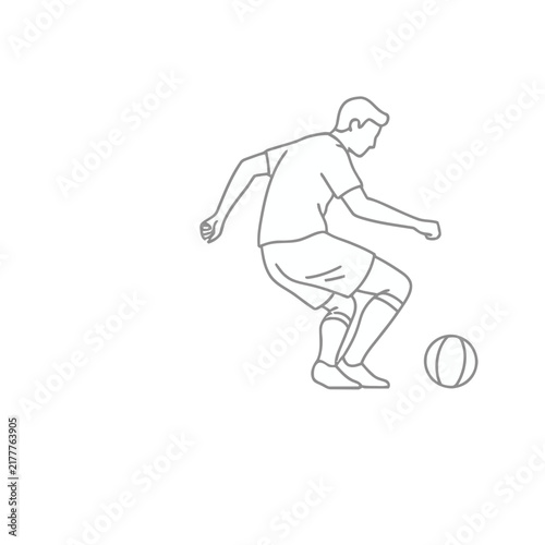 Soccer player kicking a ball