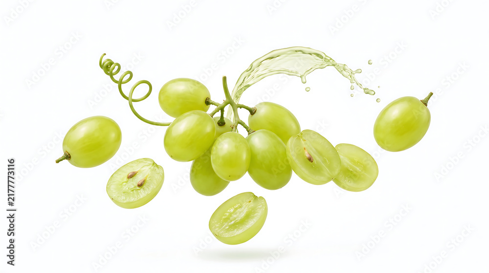 Obraz premium Fresh Green Grapes Cluster With Droplets and Slices Floating Isolated on White Background