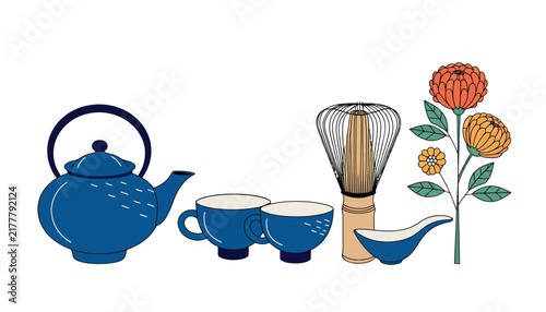 blue tea set with whisk and flowers