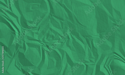 Vibrant emerald green crumpled paper texture background featuring grainy noise and crease folds pattern