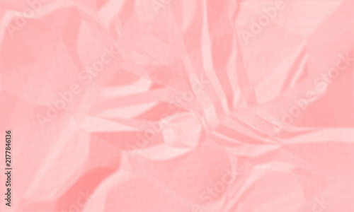 Abstract peach pink crumpled paper background with grainy texture for creative design and art projects