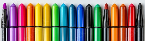 Colorful markers lined up in perfect order.
