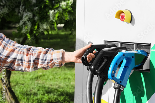 Bild auf Leinwand Electric vehicle charging station, sustainable transportation and green energy t