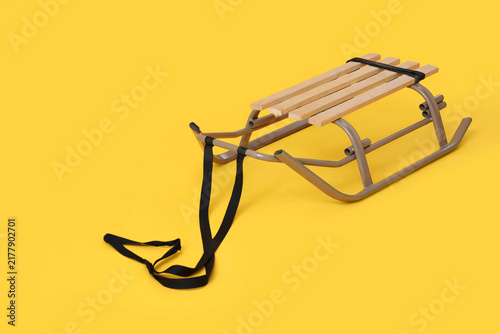 Fotografía Empty sled on yellow background