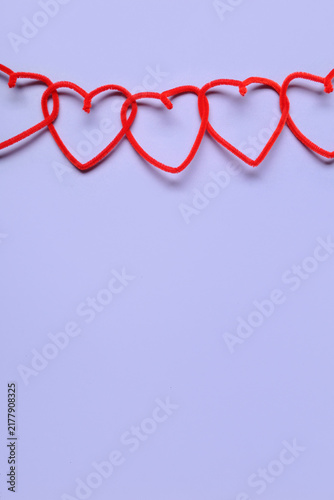 Foto Garland made of hearts for Valentines Day on grey background