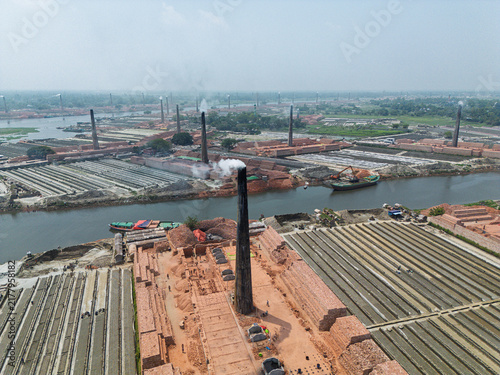 Quadro su tela Aerial View of Brick Kilns and Wetlands in Dhaka, Bangladesh