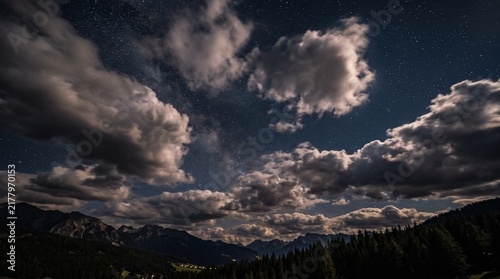 Obraz na płótnie the night sky is dramatic and incredibly beautiful, filled with thousands of stars sparkling in the dark sky
