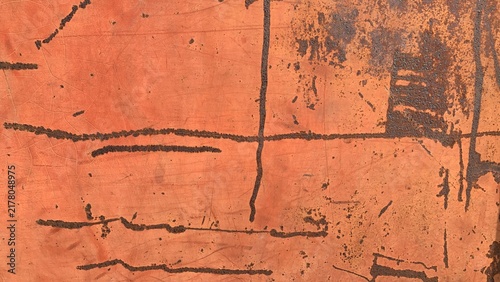 фотографія Aged rusted metal panel displaying abstract corrosion patterns and weathered sur