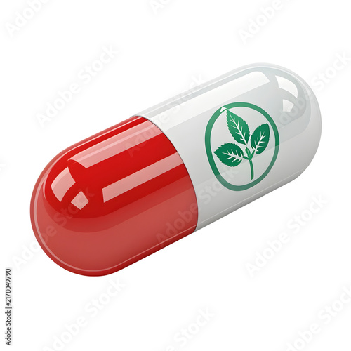 Red and white capsule with green leaf emblem during studio lighting for healthcare concept