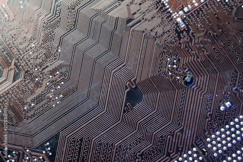 Highly dense geometric copper trace routing on a modern printed circuit board for advanced server data processing tech.