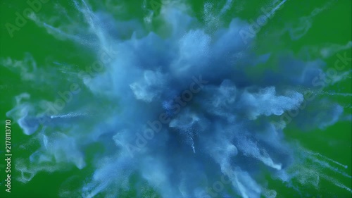 Blue powder explosion captured in three stages against a green screen.