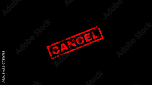 Fotografía Red cancel rubber stamp mark on black background