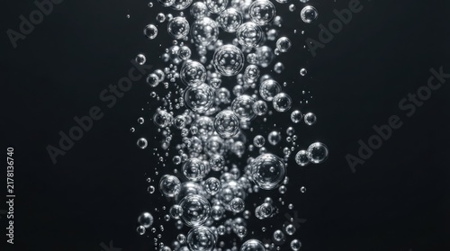Abstract macro view of ascending clear carbonated water bubbles floating upward against a deep dark black background for refreshing beverage aesthetic