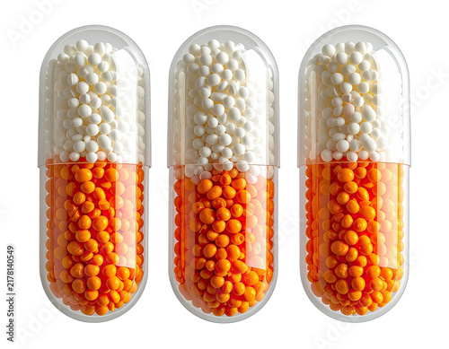 Three transparent capsules filled with orange and white granules on a black background.