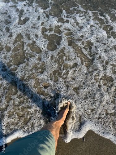 feet on the beach