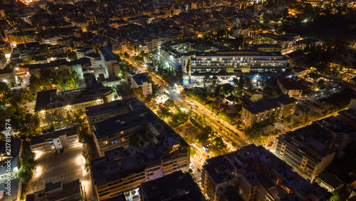 Drone view of the city lights at night