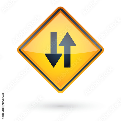 Fotografía Yellow diamond two way traffic warning sign with opposing arrows, roadway safety