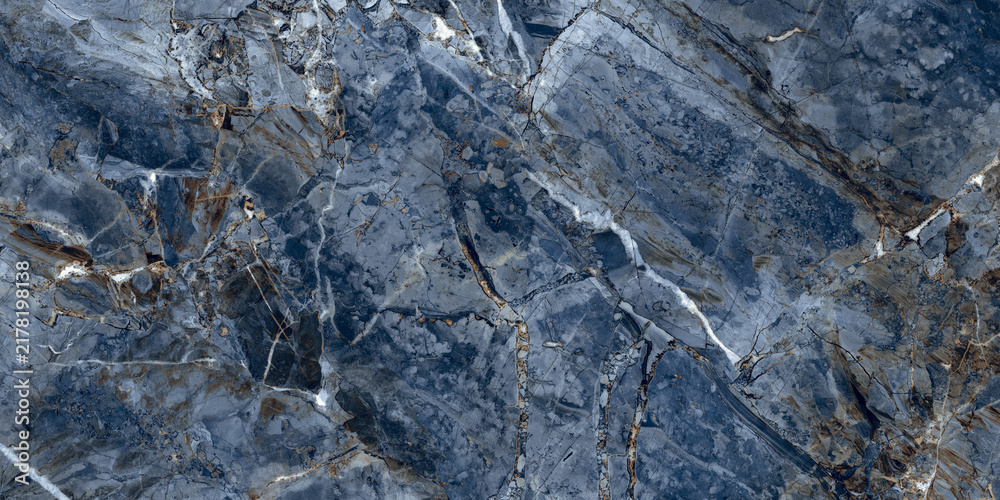 Obraz premium Elegant blue marble texture with soft natural veins and warm earthy tones, perfect for luxury interiors, ceramic tiles, and decorative backgrounds. 
