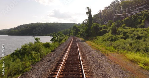 Down curving train tracks along the Hudson River in New York