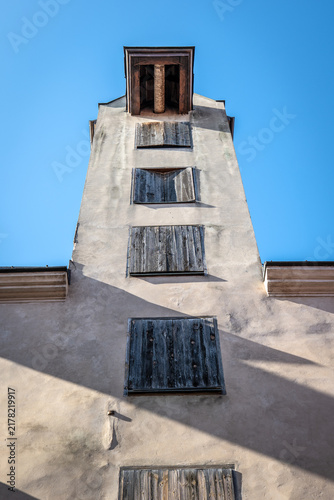 Quadro su tela Historic Warehouse with Upper Hoisting Mechanism and Wooden Loading Shutters