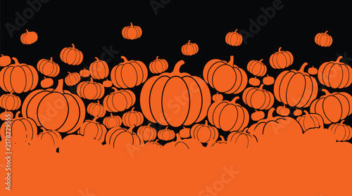 A festive halloween background featuring a collection of orange pumpkins arranged against a dark backdrop for seasonal holiday celebration and design projects