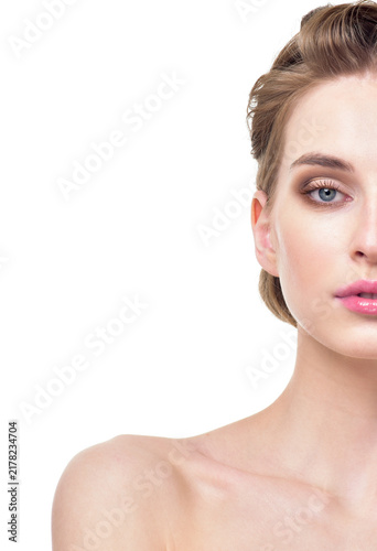 Beautiful Young Woman with Clean Fresh Skin. Close up Portrait.  Fashion Model Girl Face. Perfect Skin. Professional Makeup, gloss lips.
