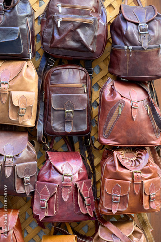 Bild auf Leinwand leather and leather bags hanging and prepared for sale to the public in a Morocc