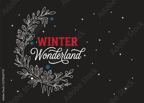 Winter wonderland text design with small snowflake icons on a light blue background