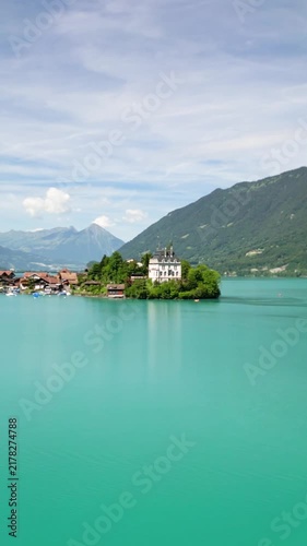 Scenic view of Iseltwald village on Lake Brienz in Switzerland.Vertical video