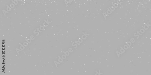 Small white particles scatter randomly on a black background. The dots vary slightly in size and brightness, creating a soft, subtle contrast. This texture can be used for backgrounds.