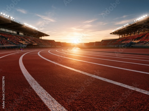 Empty Running Track in Stadium at Sunrise