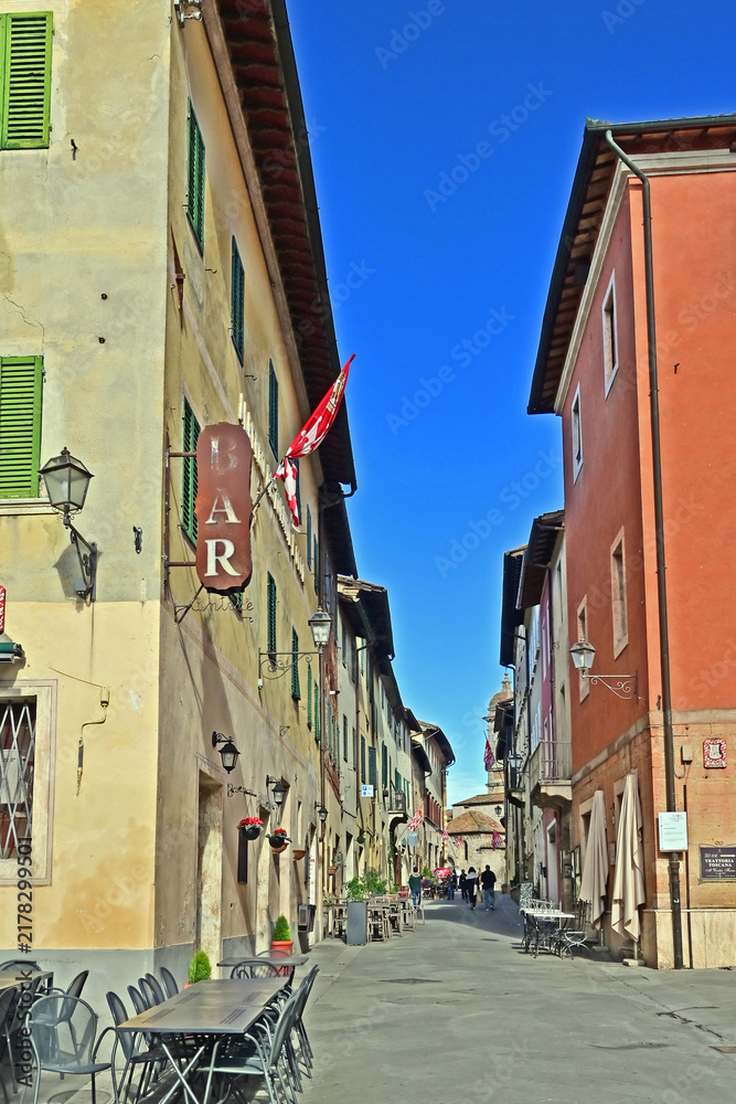 Obraz premium San Quirico d'Orcia, ancient houses and streets of the old village, Siena, Val d'Orcia, Tuscany, Italy